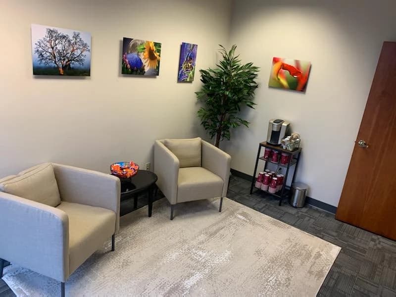 Day Tax Accounting’s Portland reception area with armchairs, artwork and plants